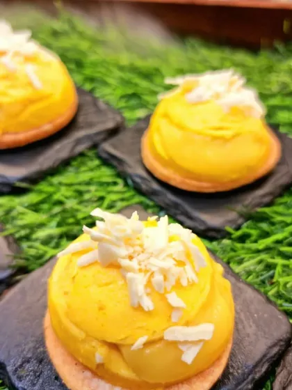 A bright and tropical Mango Mousse with White Chocolate shavings, another dessert from the Wella event. Our desserts are designed to be as beautiful as they are delicious.