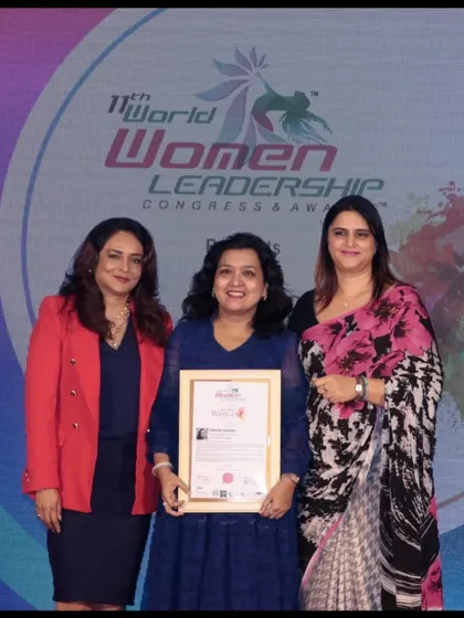 On stage receiving the World Women Leadership Congress & Award. I was honored to be recognized among stalwarts from various industries.