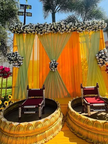 The traditional 'urli' style seating for the bride and groom at a Haldi ceremony. These details make the ceremony feel authentic and special.