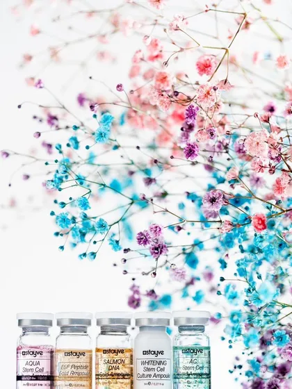 An aesthetic display of the Stayve booster ampoules I use in my treatments. Each vial is formulated for a specific purpose, from hydration with Aqua Stem Cell to regeneration with Salmon DNA.