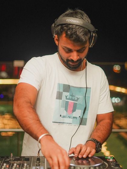 Finding the rhythm in life. A focused shot of me at the decks.