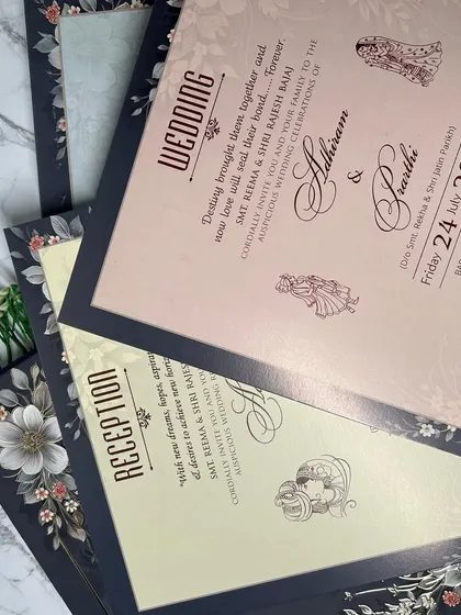 The complete suite for a modern, luxe wedding. The inserts continue the theme with a mix of blush pink and cream, beautifully framed by the dark floral border.
