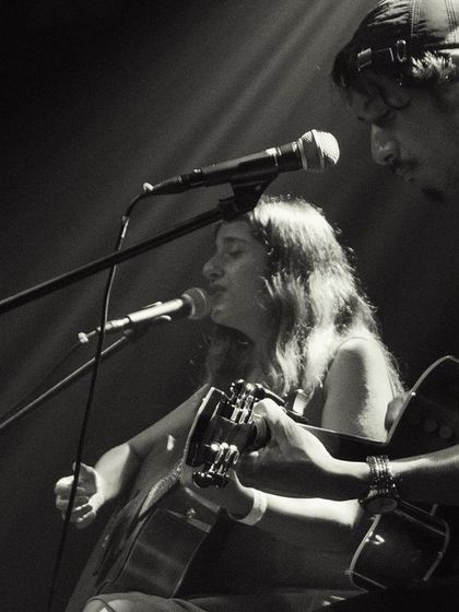 A black and white shot of a duo performance. Losing ourselves to the music while opening for the phenomenal Samar Mehdi.