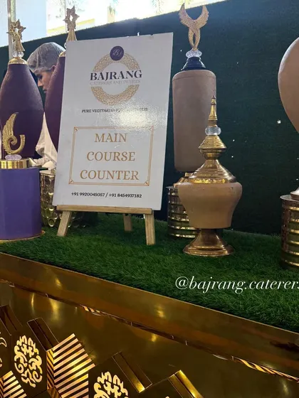 Details matter. I use custom signage and decorative elements like these ornate urns to clearly label food stations and enhance the theme of your event.