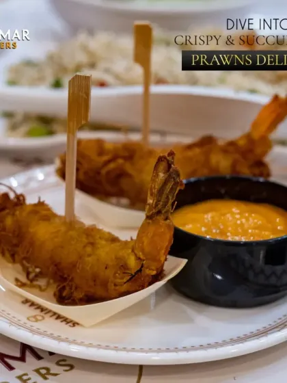 Dive into our crispy and succulent Prawns Delight. These large, fried prawns are served with a tangy dipping sauce, offering a satisfying crunch and a burst of flavor.