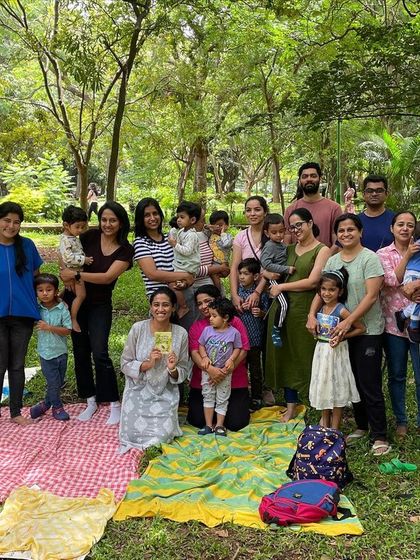 The whole group together after our 'Belonging' session. The diversity of families and the shared smiles say everything about our inclusive and welcoming space.
