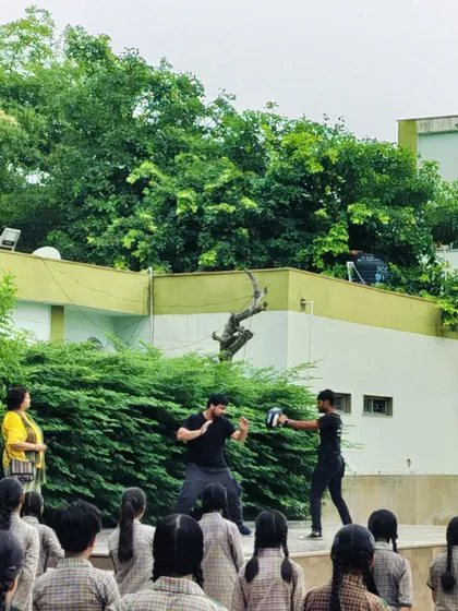 Demonstrating a striking technique to school girls during our self-defense program. The goal is to teach simple, effective moves that they can remember and use under pressure.