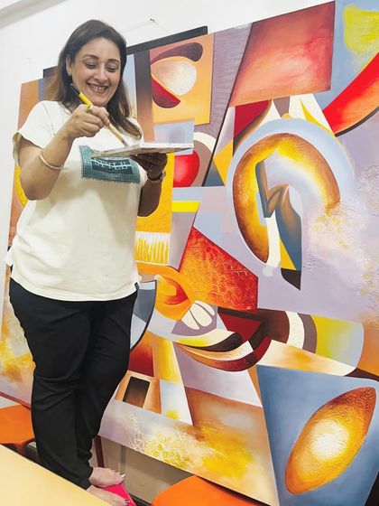 A smile of satisfaction as the painting comes together. My process is deeply personal, and I find immense joy in seeing a client's vision take shape through my hands, brushstroke by brushstroke.