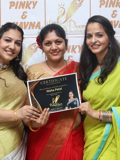 Handing a certificate to Nisha, who is now a certified professional mehndi artist. It is moments like these that make my teaching journey so fulfilling.