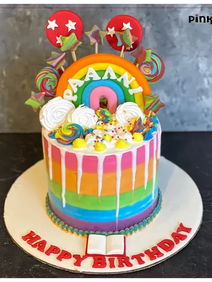We love making birthdays extra bright with cakes like this rainbow drip design. It’s packed with fun details like lollipops and sprinkles, showing how we can turn any kid's birthday party into a colorful, sweet celebration.