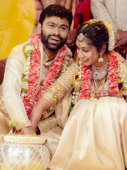 For this lovely couple's wedding ceremony, I designed coordinated outfits in classic cream and gold Kanjivaram silk. The goal was to create a timeless and elegant look that symbolized their new beginning together.