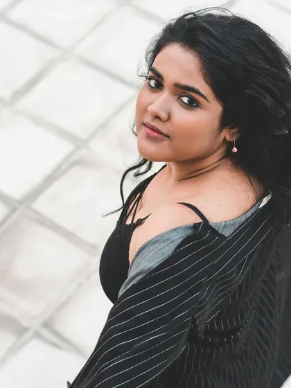 A high-angle shot from the "Tasveer" photoshoot, showcasing the artist branding for the single.
