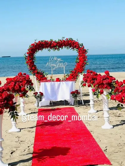 A beautiful, clear shot of the entire beach marriage proposal setup, a truly picture-perfect moment.