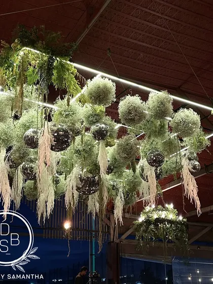 For the Karnataka Golf Association's 50th anniversary, I designed this "Disco on the Greens" ceiling installation. By combining lush greenery with sparkling disco balls and modern lighting, we created a dramatic and playful centerpiece that transformed the entire space.