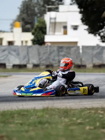A lone driver on the track during a practice session, perfecting his lines and pushing for faster lap times.