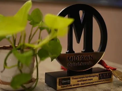 Another shot of our award, with a healthy plant in the foreground, representing our core mission of bringing green beauty to every space.