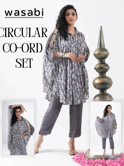 This is our Circular Co-ord Set in a charcoal grey shibori print. I chose a fluid cotton silk for this comfort-fit shirt and paired it with straight polka pants. To make it special, I added delicate Patra hand embroidery to the shoulders for a touch of quiet strength.