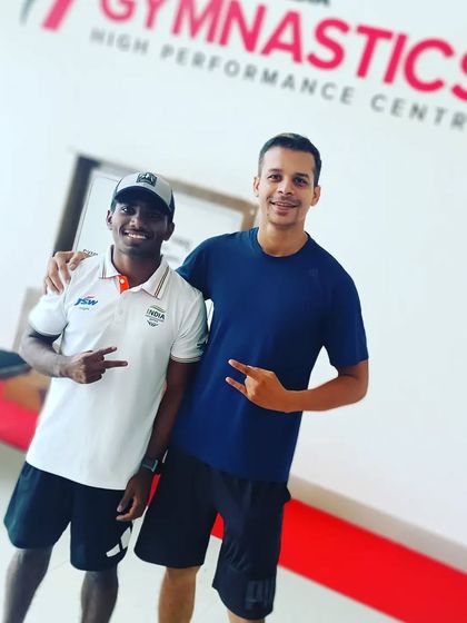 With gymnast Tapan Mohanty. These athletes have incredible dedication, and it's an honor to support their journey to the world stage.