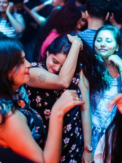 Friends dancing together.