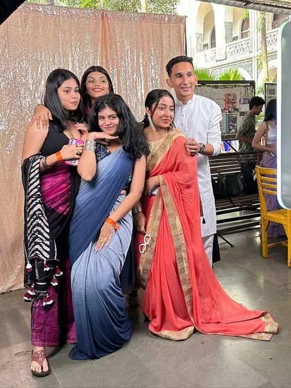 More students enjoying the photo booth at St. Xavier's College Traditional Day.