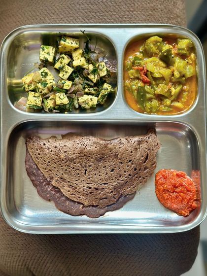 Another serving of the healthy ragi dosa with paneer, vegetable curry, and chutney.