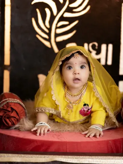 A close-up of our little Radha, with her innocent eyes and beautiful traditional attire.