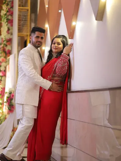 Another lovely couple shot. My client looks absolutely radiant in her red saree, with makeup that enhances her happy glow.