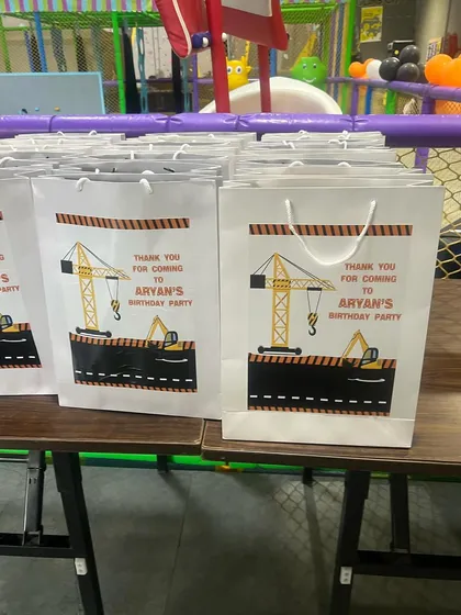 Even the return gifts are part of the theme. These custom-designed goodie bags for a construction party ensure the fun continues even after the event is over.
