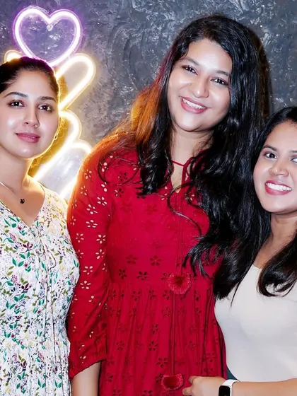 Guests posing for a photo during a club night. I create a vibrant and enjoyable setting that makes people want to capture the moment.