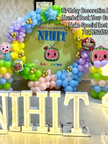 For the little ones, I bring their favorite characters to life. This Cocomelon theme for a 2nd birthday includes a colorful balloon arch, a personalized backdrop, and large light-up marquee letters with the birthday boy's name, NIKIT.