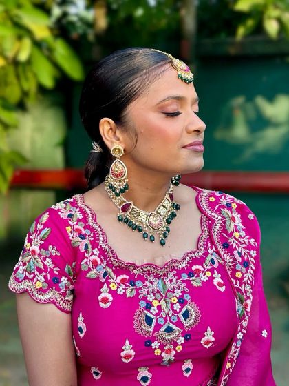 A side profile of the gota patti braid, showing the clean, sleek finish at the front which contrasts beautifully with the detailed braid.