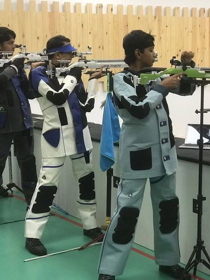 Our advanced shooters in full competition gear during a practice match. These sessions simulate real tournament conditions to prepare them for national-level events.