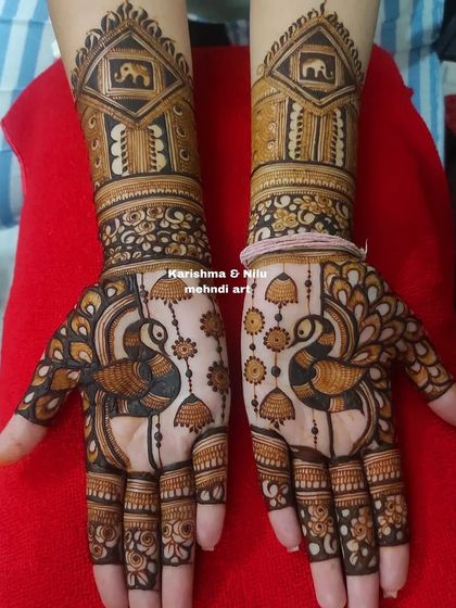 A clear view of the symmetrical peacock and jharokha design. Notice the negative space used to make the primary motifs stand out, a key composition technique I teach for creating dramatic effects.