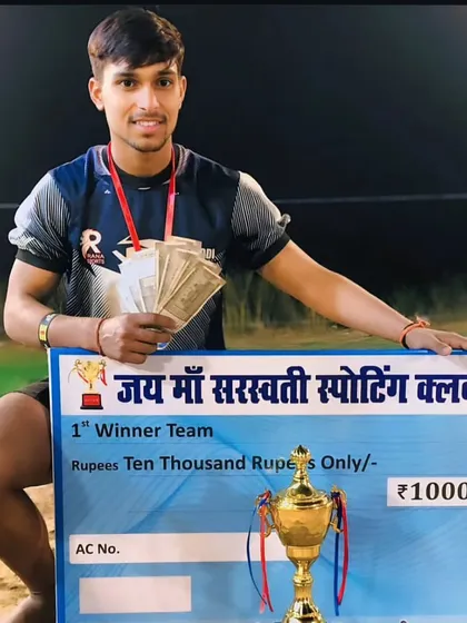One of our eight players selected for the Sub-Junior National Championship, celebrating with his winner's trophy and prize.