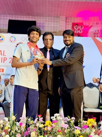 Presenting a medal to a champion at the KIO National Championship in Hyderabad. It is moments like these that make all the organizational effort worthwhile.