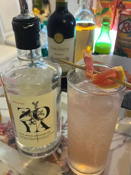A Zoya Gin cocktail with a grapefruit twist. We love experimenting with different garnishes and flavor combinations.