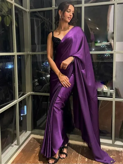 I styled Tripti Dimri in this elegant purple satin saree from Swtantra, paired with a contrasting black sequin blouse. The look is simple, modern, and incredibly chic, proving the power of color and texture.