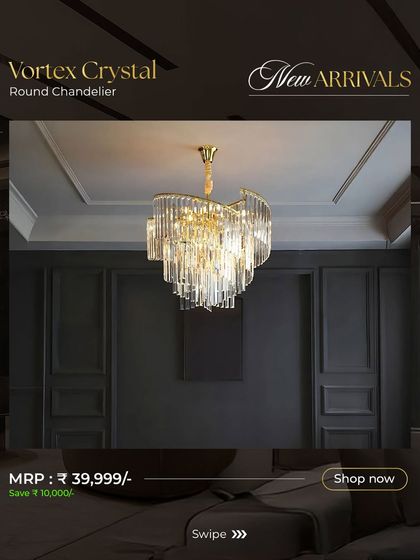 The Vortex Crystal Round Chandelier features a swirling design of crystal rods. This new arrival commands attention and adds a dynamic sense of movement and brilliance to a room.
