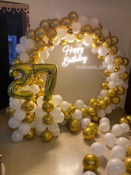 A clear, well-lit shot of the gold and white balloon circle, a very popular choice for elegant birthday party decor.