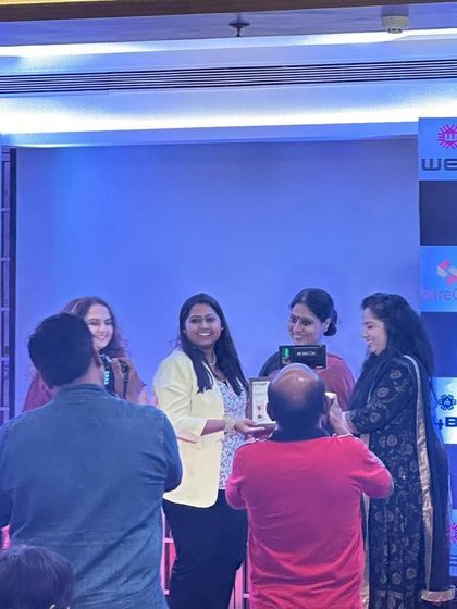 Receiving my award on stage. Moments like these motivate me to keep learning, growing, and creating the best possible handmade products.