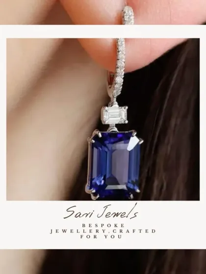 I love incorporating the deep, soulful colour of gemstones into my work. These drop earrings feature a stunning emerald-cut sapphire, perfectly balanced by the sparkle of baguette diamonds for a look of modern sophistication.
