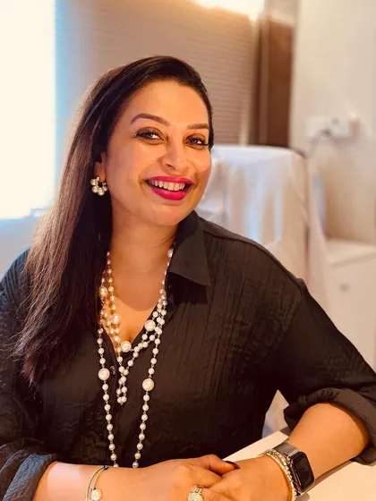 A candid photo taken in my office. My work is my passion, and I feel immense gratitude for the opportunity to help people feel good about themselves.