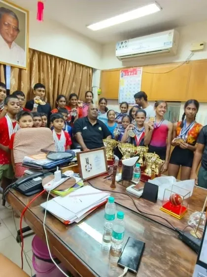 Our athletes meeting with Arvind Dada to celebrate their district-level victories. The constant support and motivation from our leadership are key to our gymnasts' confidence and continued success.