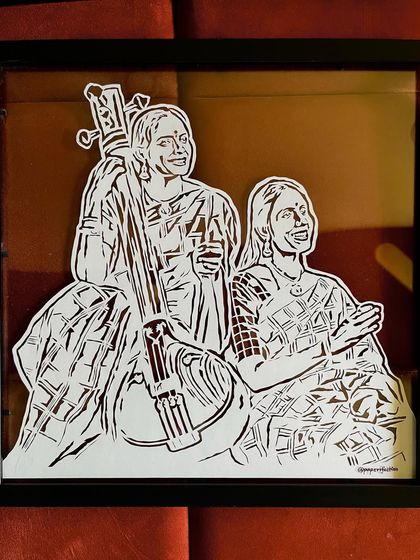 Another view of the framed portrait for Ranjani and Gayatri, this time including the tanpura. I can include special elements like musical instruments to make your portrait even more personal.
