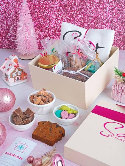 Meet 'Mariah', my big Christmas gift box. It's loaded with boozy cake slices, kulkuls, fudge, marzipan, a DIY hot chocolate kit, and my tote bag.