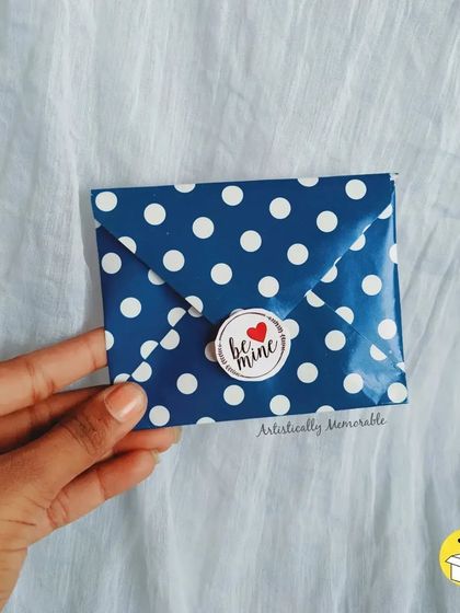 A sweet little envelope sealed with a "Be mine" sticker. It's perfect for hiding a tiny note or a piece of jewelry.