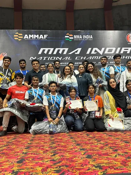 Our team photo on stage at the MMA India National Championship in Raipur. We are proud to represent Delhi and bring home 6 gold, 9 silver, and 4 bronze medals. This shows the scale of competition our students participate in.
