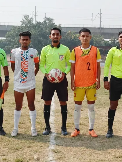 The captains and referees before the U19 Super 6 match against Olimpic FA.