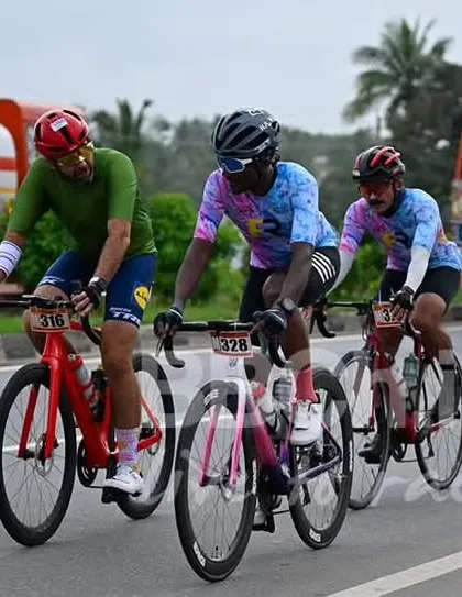 A trio of masters riders in their distinctive tie-dye kits, adding a splash of color to the race.