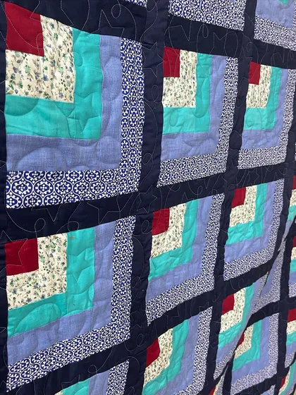 A detail shot of the Quarter Log Cabin blocks.